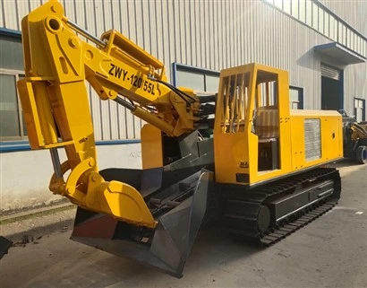 Mucking Loader Has Crawler And Wheel Type
